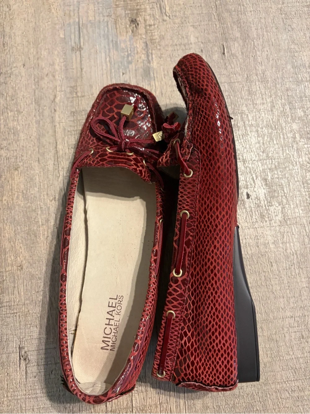 Michael Kors Burgundy Snake-Embossed Moccasin Flats with Gold Accents